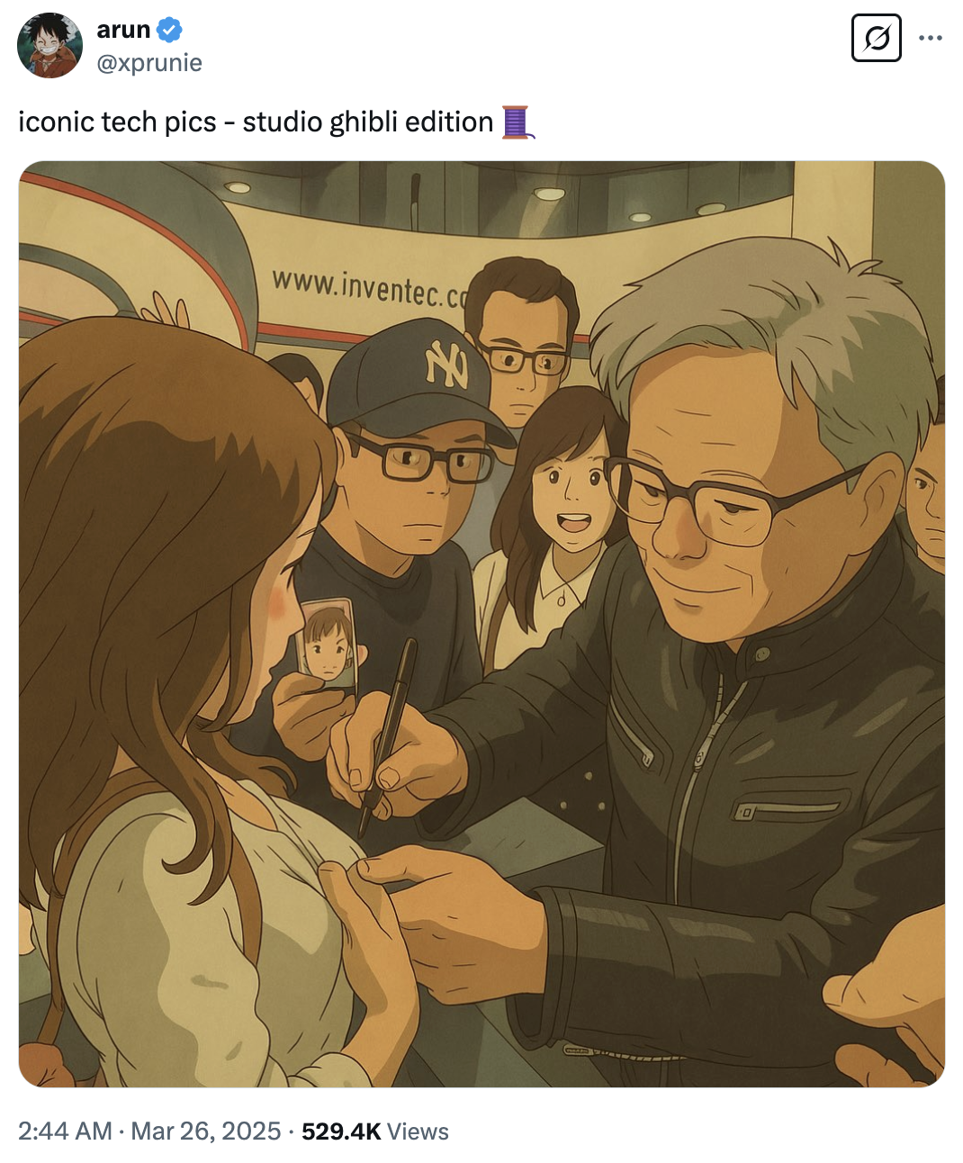This meme is a humorous image of a scene from the movie "The Matrix" where the character Neo (played by Keanu Reeves) is being forced to take a photo with a group of people. The image is captioned "iconic tech pics - studio ghibli edition" and features a cartoonish illustration of the scene. The image is a playful and humorous take on the idea of "iconic tech pics" and the "studio ghibli edition" part is a nod to the Japanese animation studio's style.